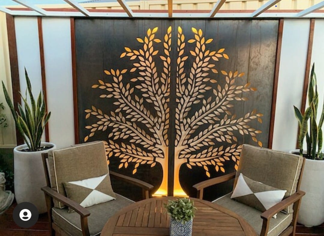H & S Metalcraft: tree outdor screen wall ard behind two outdoor chairs